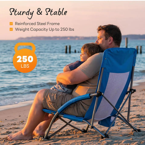 Father and son sitting on Low Profile Folding Beach Chair With Cup Holders And Carry Bag at sunset on beach, highlighting stability.