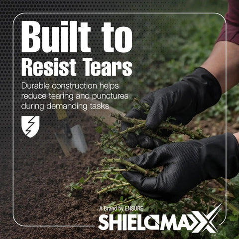 Black Nitrile Work Gloves Deliver Badass Heavy Duty Protection With A Raised Diamond Pattern For Sick Non Slip Grip Perfect For Auto Repair Plumbing And Garage Projects Requiring Tough Armor For Daily Hustle Workers, hands gripping branches outdoors.