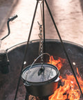 Pre Seasoned 2 Qt Cast Iron Dutch Oven With Flat Bottom For Stovetop And Campfire Use hanging over flames