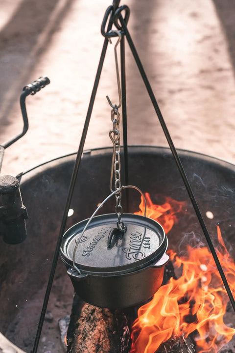 Pre Seasoned 2 Qt Cast Iron Dutch Oven With Flat Bottom For Stovetop And Campfire Use hanging over flames