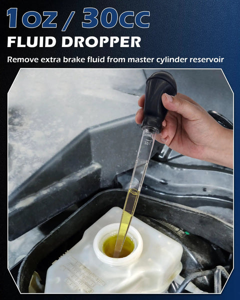 Hand using 1oz fluid dropper to remove brake fluid from master cylinder reservoir in vehicle