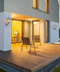 Durable Outdoor Wall Light With Dusk To Dawn Sensor on modern porch, white anti-corrosion plastic fixture, evening setting