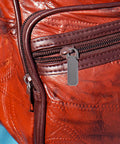 Heavy Duty Metal Zipper Pull Tabs Replacement Set With Super Straightforward Tool Free Install For Jacket Fixes Clothing Repairs And Gear Upgrades In A Compact 12 Piece Pack That Gives You Zero Sweat Quick Repairs Every Single Time on an orange leather bag.