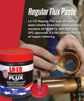 Water Soluble Copper Flux Paste for Soldering, All Weather Plumbing Grade, Brush In Cap, 4 Oz, Non Toxic, Lead Free, No Zinc Chloride, Helps Solder Flow Like A Pro And Cleans Pipes, Made In USA, shown with open cap and brush applying flux to pipe.