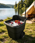 Heavy Duty 15 Gallon Rolling Garden Cart With Retractable Handle And 7 Inch Wheels For Outdoor Yard Work A Real Workhorse Lightweight Resin Utility Wagon For Gardening Lawn And Home Hauling loaded with ice and berries by a tent and lake