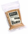 Legit One Pound Bag Of 100 Percent Natural Hide Glue Dry Granules For Lutherie And Woodworking With 315 Gram Strength in clear packaging.