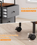 Close-up of Three Tier Rolling Diaper Caddy Organizer with dividers, drawers, and wheels, showing soft-touch drawers and 360-degree swivel wheels.