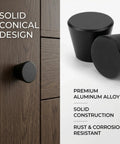 Built Tough Black Round Cabinet Knobs Package Of Six Heavy Duty Aluminum Dresser Handles on a drawer, showing smooth conical design.