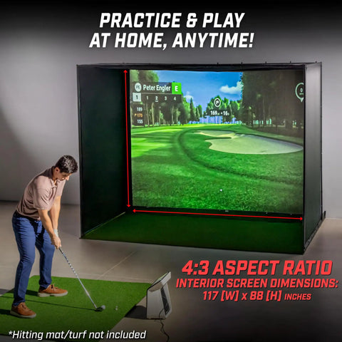 Man using 10 By 8 Foot Golf Simulator Enclosure Net With Frame And HD Impact Screen Kit in home setting, low rebound surface visible.
