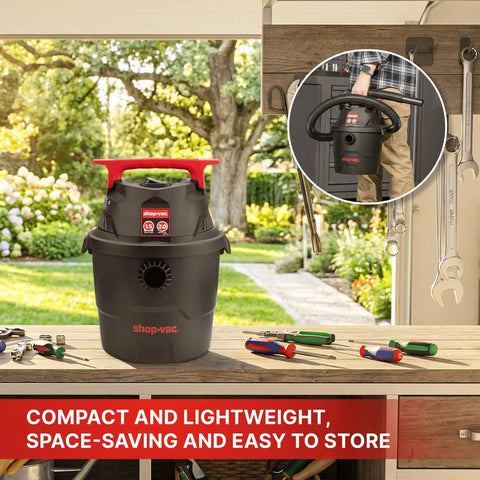 Compact Wet Dry Vacuum With 2 Point Zero Peak Hp Motor And 1 Point Five Gallon Bucket on a garage workbench for easy spills cleanup.