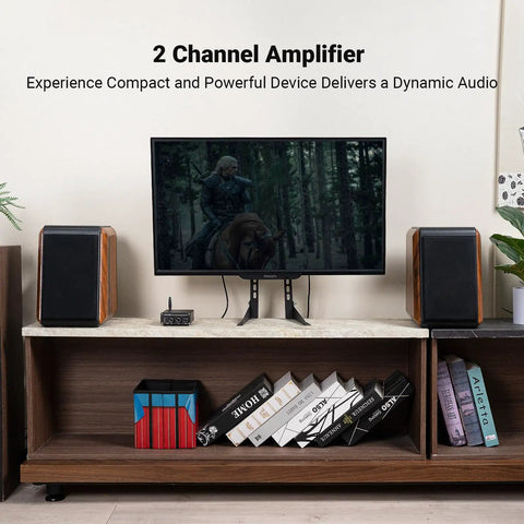 Bluetooth Stereo Amplifier 100W Per Channel, 2 Channel Class D Power Amp setup with passive speakers on a bookshelf