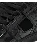 Close-up of Clone Black Patent Silver Men's Skate Shoes Size 10 Medium with reinforced high abrasion uppers for durability.
