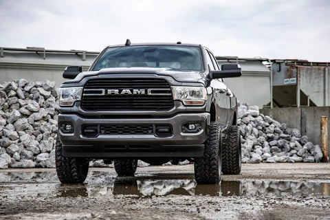 Front view of a Ram 2500 with the Two And A Half Inch Suspension Leveling Kit For 2014 2024 Ram 2500 3500 Four Wheel Drive