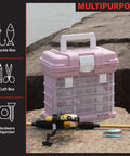 Pink Portable Tool Box With Four Removable Drawers And Customizable Compartments For Hardware Fishing Tackle Beads Or Crafts Lightweight And Travel Friendly For Easy Grab And Go Organization on a rock near a fishing rod.
