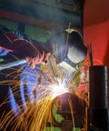 Game Changing Smooth Rolling ER70S6 Mig Welding Wire 0.045 Inch Diameter Two Pound Spool Low Carbon Mild Steel With Zero Hassle Arc And Low Splatter For All Position Gas Shielded Shop Builds during welding with sparks.