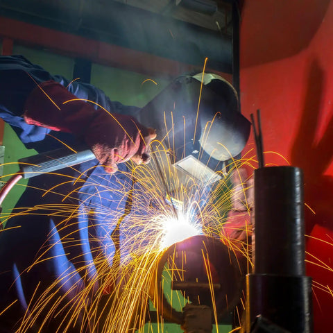 Game Changing Smooth Rolling ER70S6 Mig Welding Wire 0.045 Inch Diameter Two Pound Spool Low Carbon Mild Steel With Zero Hassle Arc And Low Splatter For All Position Gas Shielded Shop Builds during welding with sparks.