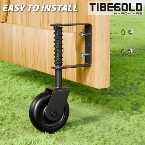 Heavy Duty 4.3 Inch Gate Wheels Black Outdoor Fence Casters With 360 Degree Swivel Spring Loaded Design mounted on a wooden gate