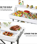 Two Tier Folding Ice Table With Drain And Detachable Skirt, 4 Foot Ice Cooler Table displaying food and drinks at different heights