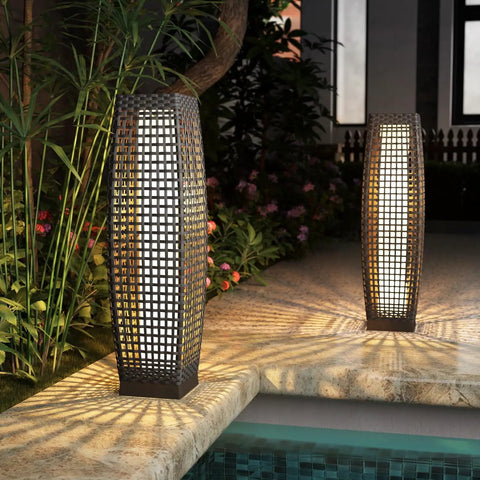Outdoor Solar Powered Floor Lamp With Weatherproof Wicker Lantern in garden setting by pool, two lamps, silver gray.