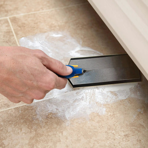 Gum Rubber Margin Float 6 Inch By 2 Inch With Comfort Grip Handle for grout in tight spaces under toe kicks and cabinets.