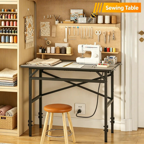 Space Saving 1000 Pound Metal Work Bench For Garage With 38.58 Inch Adjustable Height Table And Built In Power Strip Ideal Sewing Table And DIY Workshop Hub For Home Projects in use with sewing supplies and a stool.