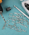 Heavy Duty 1 Mm By 17 Mm Cotter Pins Spring Fasteners Hairpin Retaining Pins R Clip Kit For Bolts And Pins In Metalwork And Equipment Applications 20 Pcs Galvanized Carbon Steel Silver Tone Uxcell scattered on a workbench with a drill and tools.