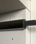 Set Of Three Push To Open Cabinet Latches With Silent Magnetic Catch For Dead Simple Drawer Opens Light Finger Tap Action Silver kitchen hardware latch mounted on a cabinet.