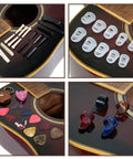 Assorted guitar accessories on acoustic guitar, part of Guitar Setup And Repair Toolkit For DIY Enthusiasts With Fret Leveling Beam