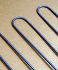 Close-up of Genuine OEM Broil Element 316203301 for Electric Ranges, showing black metal loops for high heat oven broiler replacement.