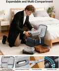 Man packing clothes into a 16 Inch Expandable Underseat Carry-On Luggage With Wheels, Grab-And-Go Top Opening For Easy Access.