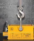 Heavy Duty Steel Magnetic Lifter Rock Solid Workhorse 6600lb Metal Lifting Magnet With Dual Safety Lock For Shop Crane And Auto Repair seen with a hook.
