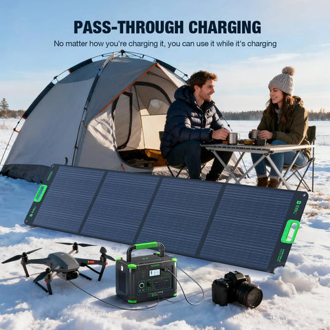 Power On The Go Portable Power Station With 1000W Output And 999Wh Capacity Solar Generator used for charging devices while camping in snow.