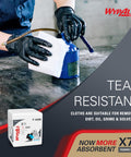 PowerClean X70 Medium Duty Cloths Quarterfold Wipes for Industrial Cleaning shown wiping oil from surface.