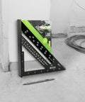 7 Inch Aluminum Rafter Square With Imperial Hip Valley Scales For Dead Easy Roofing Layouts, positioned against a wall.