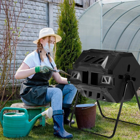 Person operating a Dual Chamber Rotating Compost Tumbler No-Fuss Spin For Continuous Cycle Composting, 42 Gallon Large Capacity Outdoor Bin.