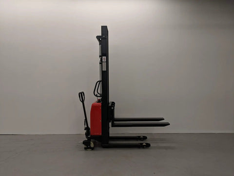 Heavy Duty Thin Leg Semi Electric Pallet Stacker side view with 138 inch lift height and 2204 lbs capacity on warehouse floor.