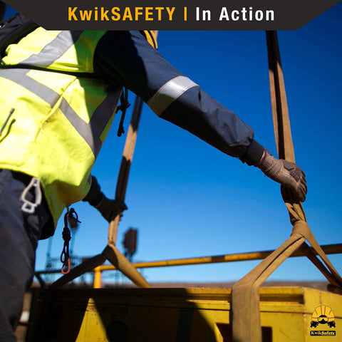 Worker using Mighty Sumo 1 Inch By 10 Foot Poly Web Sling Lifting Strap For Construction And Rigging in action on site