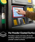 Person using touchscreen on a powder-coated gas pump interface, highlighting suitable use for powder-coated surfaces.