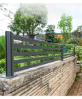 Tough As Nails Aluminum Railing Pickets Kit With Hassle Free Custom Length Setup For Outdoor Patios Gardens And Retaining Walls Heavy Duty Fence Extension Panel Smooth Matte Coating on stone wall in garden.