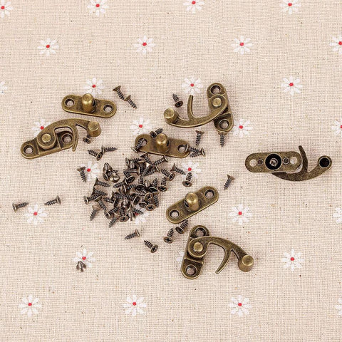 20 Pieces Jewelry Box Latches Set Thickened Solid Bronze Tone Antique Style Box Latch With Zinc Alloy Construction Includes 80 Replacement Screws Right Latch Buckle For Secure Elegant Storage displayed on fabric surface.