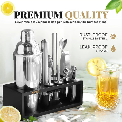 Ultimate Home Bar Mixology Kit With Stand 15 Piece Silver Bar Tool Set with cocktail glass on marble surface