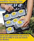 Person holding a hardware tackle box with removable compartment organizer and reversible carrying case for screws nuts and bolts.