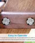 Fifty Piece 8-32 T Nuts Set Featuring Zinc Plated Carbon Steel Construction installed in wood, showing three pronged design for woodworking.