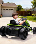 Child riding green Kids 24V Electric Go Kart With Dual 300W Motors, 9Ah Battery, 8 MPH Rad Drift Power in driveway