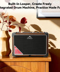 Portable 15W Guitar Amp With Bluetooth Built In Looper And Drum Machine 8 Voices FX Effects Aux OTG displayed on a wooden shelf