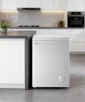 Compact Deep Chest Freezer Featuring 3.5 Cu Ft Capacity And Durable Storage Baskets White Cold Storage Appliance in modern kitchen.