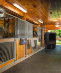 Industrial Swamp Cooler With 22000 CFM And 46 Gallon Water Tank in horse stable providing cooling relief to horses.
