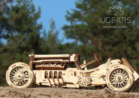 3D Wooden Puzzle Car Kit Inspired By Classic Grand Prix Racer With A Fully Functional V8 Engine, Ultra Detailed U9 Style Mechanical Model You Build And Enjoy, A Hands On Racing Car Project For Adults And Teens. side view of wooden Grand Prix car kit