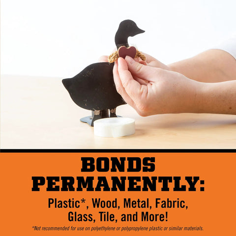 Hands demonstrating Heavy Duty Double Sided Glue Tape For Quick Fixes And Permanent Bonding on wood and metal craft project