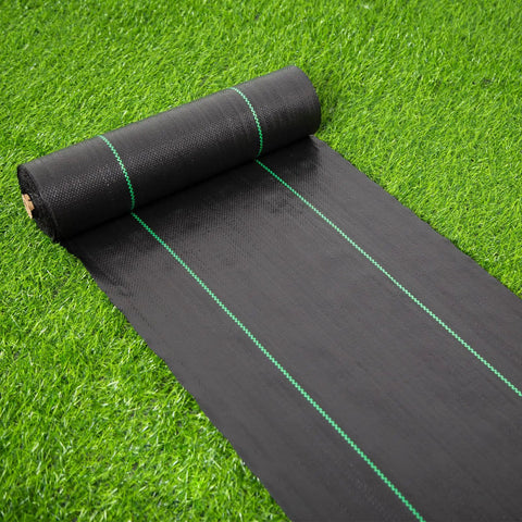 17 Inch Wide By 50 Feet Long Heavy Duty Landscape Fabric Weed Barrier Woven Geotextile Ground Cover rolled out on grass